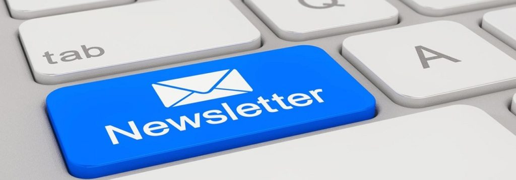 Person subscribing to a newsletter on a laptop